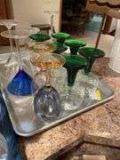 Basement. Two trays of stemware including crystal wine glasses