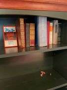 Den. Bookshelf. Green finish; Approximately 73 inches tall and 30 inches wide. Well made and contains a few classic books.