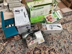 Nice lot includes Cuisinart meat grinder, food, saver, slicer, home medics massage unit. All for one money.