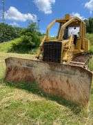 John Deere 850 B steel track dozer. Approximately 1879 hours on meter. Open four post canopy. Tilt blade . Not Started, needs a jump . Product ID number T0850BH741385. - $1000 deposit. balance in ACH or certified check within 48 hours of auction close