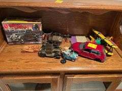 Basement. Lot of toy and collectible cars and miscellaneous.