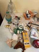 Then. Enormous lot of decor pieces. Treasures abound. Entire table top.