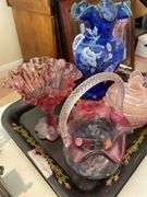 Living room. Tray of colored glass featuring Fenton.