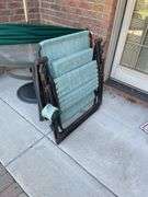 Outdoor set includes four chairs and round table also includes three miscellaneous outdoor side chairs