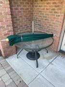 Outdoor set includes four chairs and round table also includes three miscellaneous outdoor side chairs