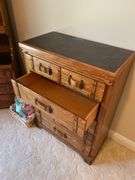 Quality twin bedroom set. Two single beds with frame and Sealy Posturepedic mattresses and bedding. Matching dresser, nightstand, bookshelf cabinet. Includes lamp on nightstand and miscellaneous items in drawers and shelves.