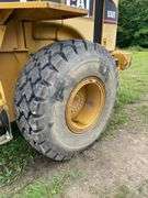 CAT 930 G wheel loader. Diesel engine. Cab/EROPS. serial number CAT8938GLTWR88846. 4232 hours showing on Dash. Started and ran. Quick coupler bucket includes set of forks. AC Not working. See Photos for Video of Equipment in Operation. FOR THOSE AT FIRST PICKUP: this loader was used by Big Jim to load out the auction This will be used for the load out on the Pick Up cannot be removed until final hour of Pick Up*- $1000 deposit. balance in ACH or certified check within 48 hours of auction close- NO Sales Tax Collected