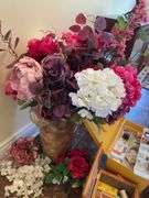Entryway. Sewing essentials and pho flowers.