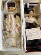 Two collectible dolls, boxed.