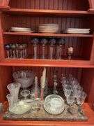 Dining room. Large lot of high quality crystal Stemware. Miscellaneous plates.
