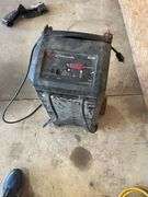 Schumaker SC1400 Battery Charger & starter. Excellent well made unit we used this several times. Cannot be removed until end of scheduled pick up