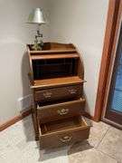 Newer tamber door secretary with brass desk lamp. Easy loadout.