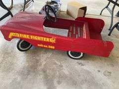 Vintage pedal car with all four wheels, pedals, and steering wheel intact