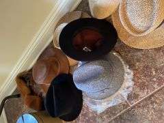 Entryway. A collection of hats.