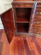Dining room. Ebert furniture company glass China Cabinet, very high quality. 52 inches wide 80 inches tall. With light inside in good condition Cherrywood finish.
