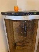 Haier Wine Cooler plugged in and working.