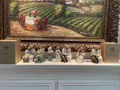 Living room. A collection of Willow tree figurines. Some have original boxes.