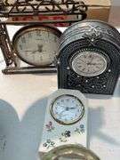 Living room. Collection of clocks and miscellaneous.