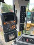 2014 CAT 980 K wheel loader 18,452 hours showing on meter. Cat ID CAT0980KVW7K02430. Serial number W7K02430.Engine serial number TXM06203. Approximately 369 hp. Diesel engine. Cab/ROPS. Includes scale, reader with printer, located in cab see photos for detail. AC blows Ice Cold. See Photos for Video of Equipment in Operation.- $1000 deposit. balance in ACH or certified check within 48 hours of auction close- NO Sales Tax Collected