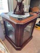Living room. Two matching lamps with two side tables (one is a glass curio side table) and TV trays on stand. One TV tray is missing. Nice lot of furniture.