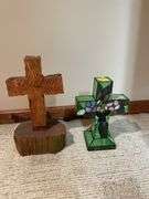 Basement. Two crosses one lights up the other carved from wood. Approximately 12 and 16 inches tall.