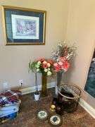 Sunroom. Lot of decor. Vases. Unique baskets and plates. With framed print.