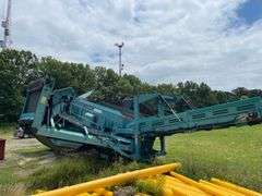 2013 Terex warrior 1800 portable tracked power screener. Diesel engine driven plant. Hydraulic wing conveyor. 416 Hours. Original Hours.ID number PID00123ADGD26434. Running at Set Up - $1000 deposit. balance in ACH or certified check within 48 hours of auction close
