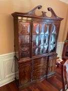 Dining room. Ebert furniture company glass China Cabinet, very high quality. 52 inches wide 80 inches tall. With light inside in good condition Cherrywood finish.
