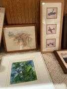 Basement. Large lot of framed wall art includes some prints photographs unique scenes. Nice variety review pictures for all pieces.