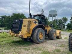 2014 CAT 980 K wheel loader 18,452 hours showing on meter. Cat ID CAT0980KVW7K02430. Serial number W7K02430.Engine serial number TXM06203. Approximately 369 hp. Diesel engine. Cab/ROPS. Includes scale, reader with printer, located in cab see photos for detail. AC blows Ice Cold. See Photos for Video of Equipment in Operation.- $1000 deposit. balance in ACH or certified check within 48 hours of auction close- NO Sales Tax Collected