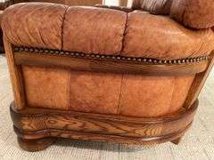 Basement. Assuming Ligne Mur. Well-made leather furniture, set sofa two side, chairs and ottomans. (One ottoman found later not pictured) Some Loss review the photos. But high quality furniture set.