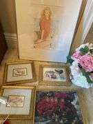 Bedroom. Framed art pieces and art glass lamp.