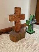 Basement. Two crosses one lights up the other carved from wood. Approximately 12 and 16 inches tall.