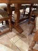 Country dining set in Oak, 34 x 83 pedestal table with eight ladder back chairs. Chairs are very solid and this is a nice quality set. Also includes Oak side cabinet with drawers. Easy loadout through walkout basement.