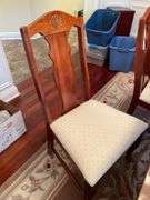Dining room. Dining room table with leaf and cover. Includes six matching chairs. Only One captains chair.. Not including contents. Chairs may be different maker than table.