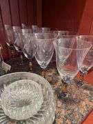 Dining room. Large lot of high quality crystal Stemware. Miscellaneous plates.