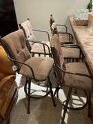 Basement. Five barstools. Cushioned and in good condition. By the piece times bid.