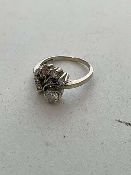 Vintage ladies ring. Engraved 14 K. Tested positive for diamonds. Total weight 4.4 g.
