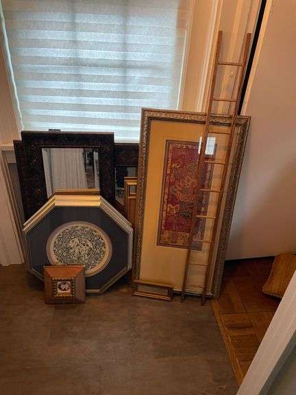 Lot of mirrors and framed pieces.