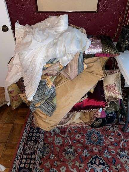 Large amount of textiles, drapes and throws.