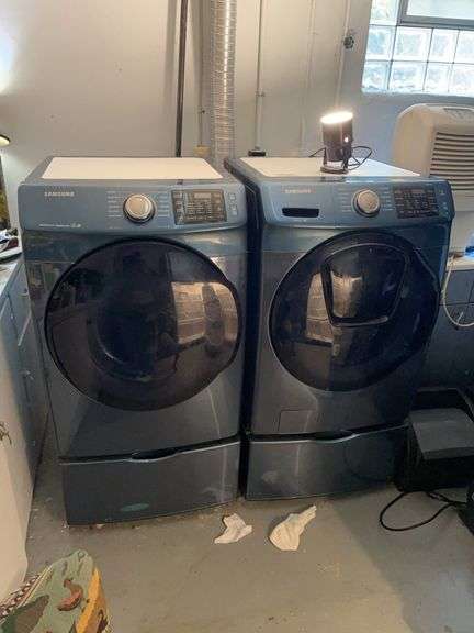 Samsung washer and dryer front load on pedestals in cobalt blue. See tag pictured for model number. Gas dryer. These were working ￼in Place and both power on bring help. By the piece times your bid.