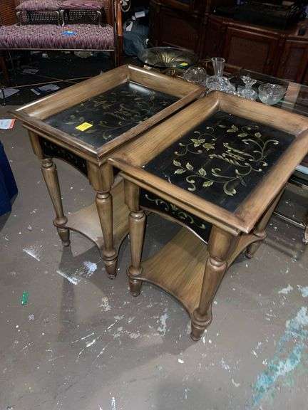 Pair of matching ebonized coffee tables