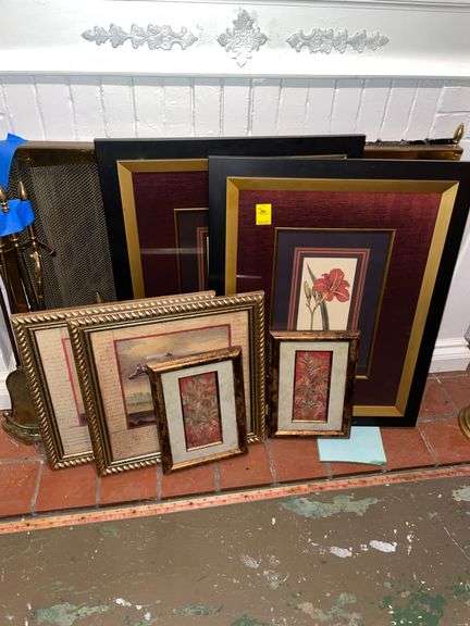 Six framed decor prints.