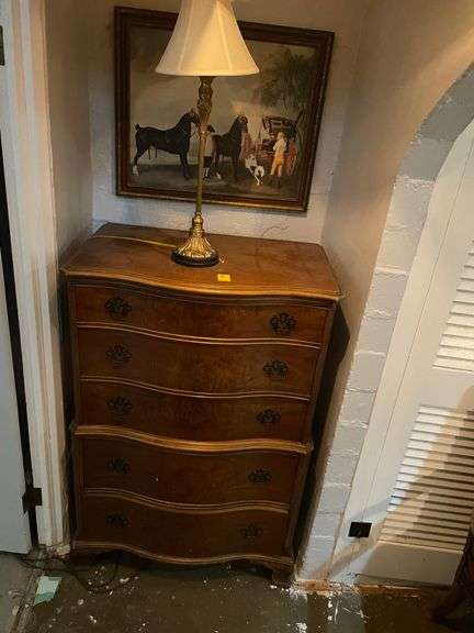 High-quality serpentine front dresser includes lamp and print. Basement.