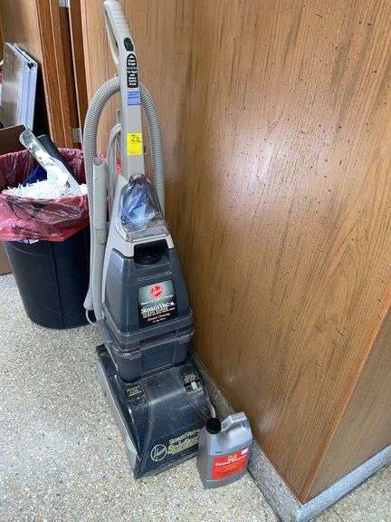 Hoover steam vac with cleaner.