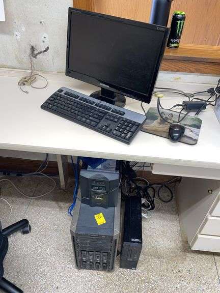 PCs and Back Up power supply in reception area includes two monitors.