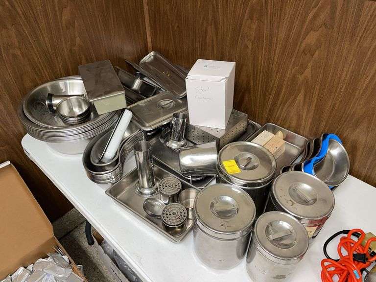 Large lot of stainless steel, trays, surgical trays and canisters.