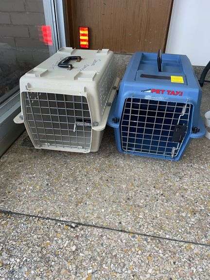 Two smaller animal carriers