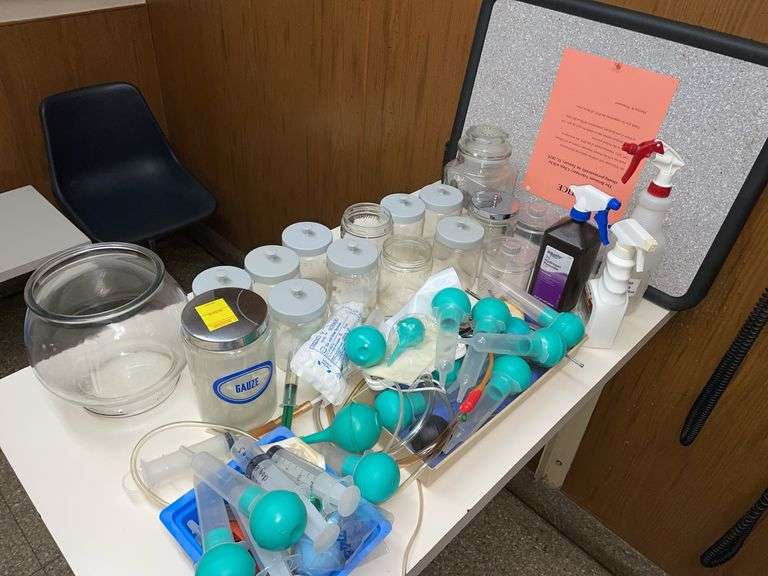 Large lot of syringes, canisters, and miscellaneous.