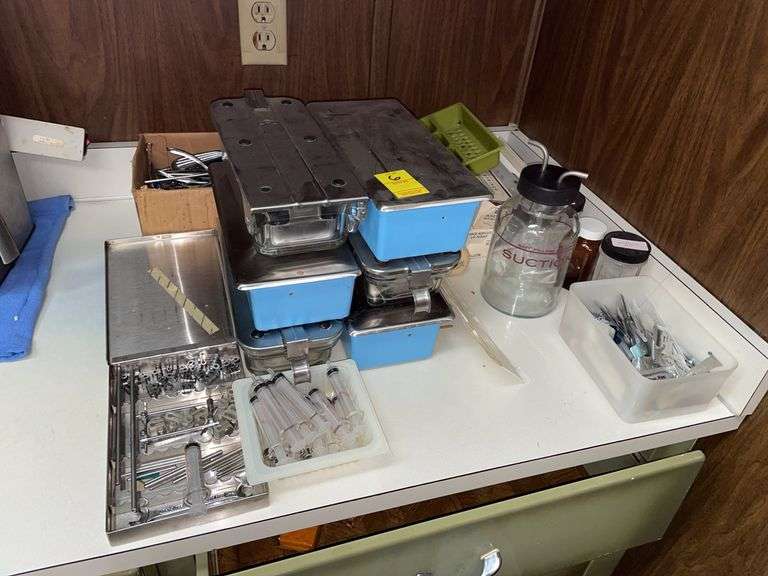 Miscellaneous, sterilizer, trays, instruments, vintage glass syringes.